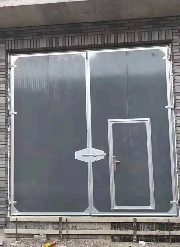 大武口工业平开门在大型设备制造车间的应用实例